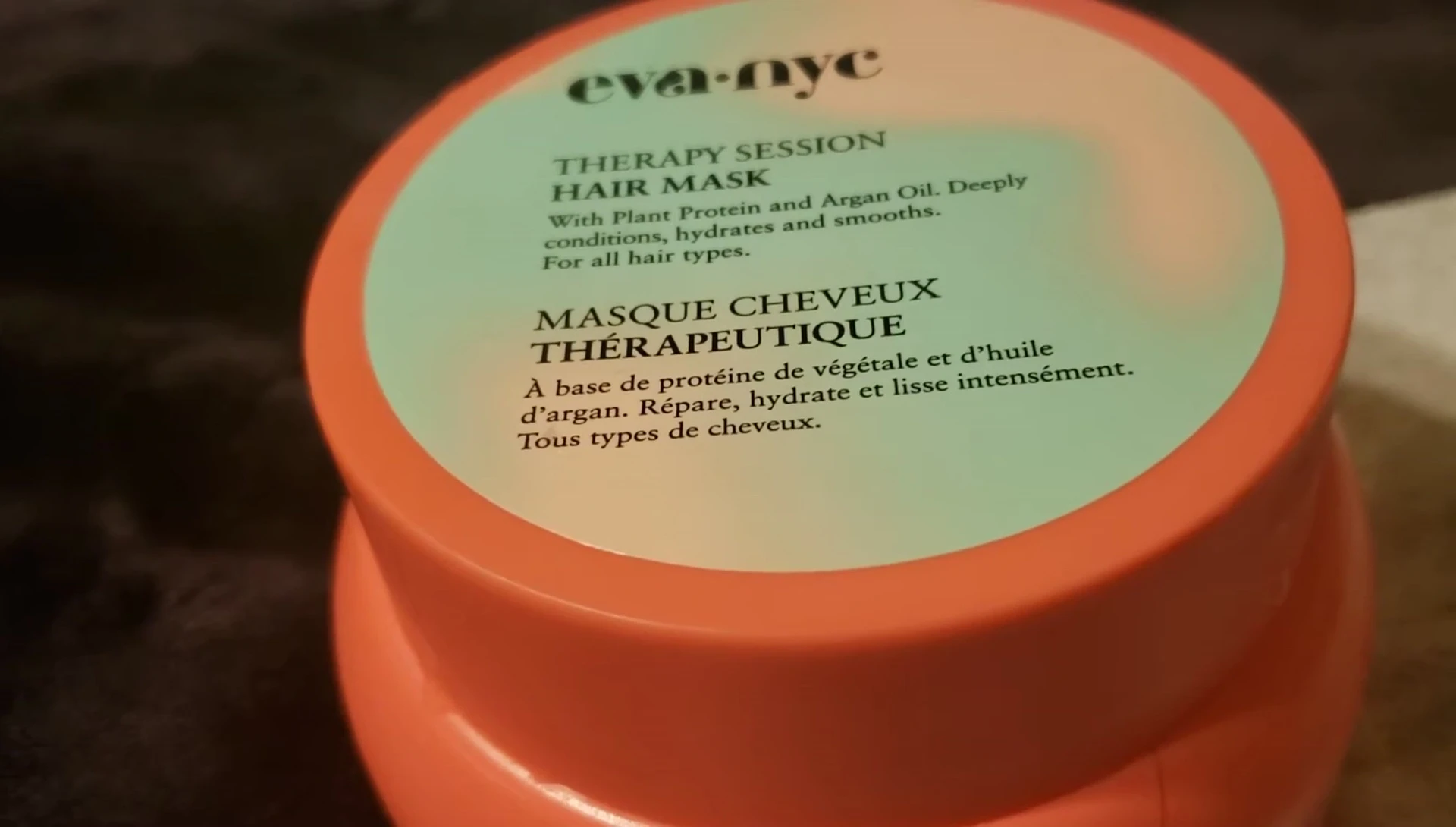 The reviewer showing the Aztec Secret Indian Healing Clay.