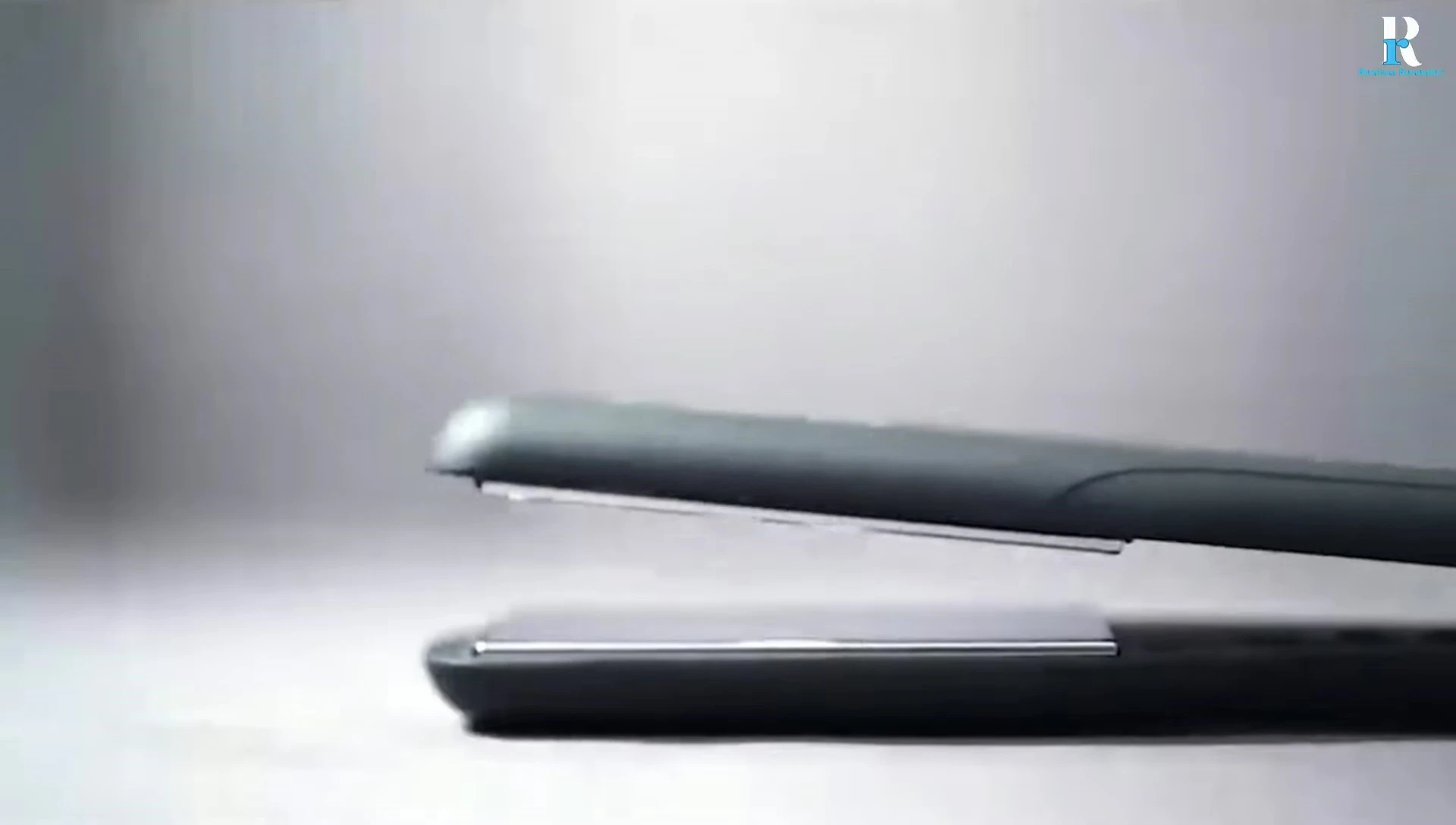The high-end hair straightener in use.