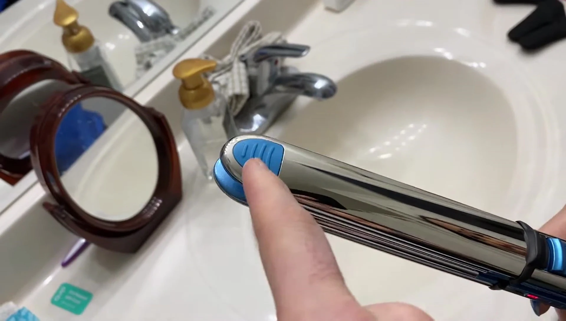 Silicone tips on the hot plates of the Babyliss Pro Nano Titanium flat iron.