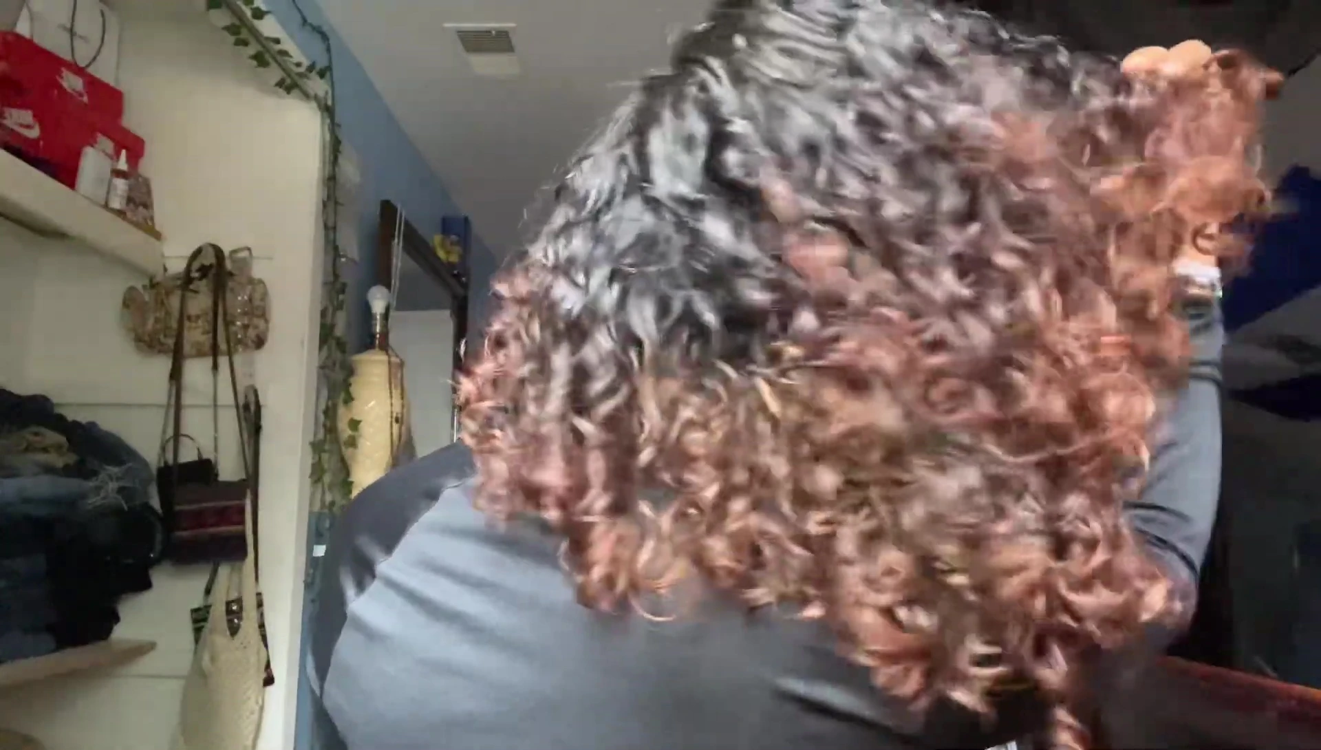 Back view of the vlogger's finished hair