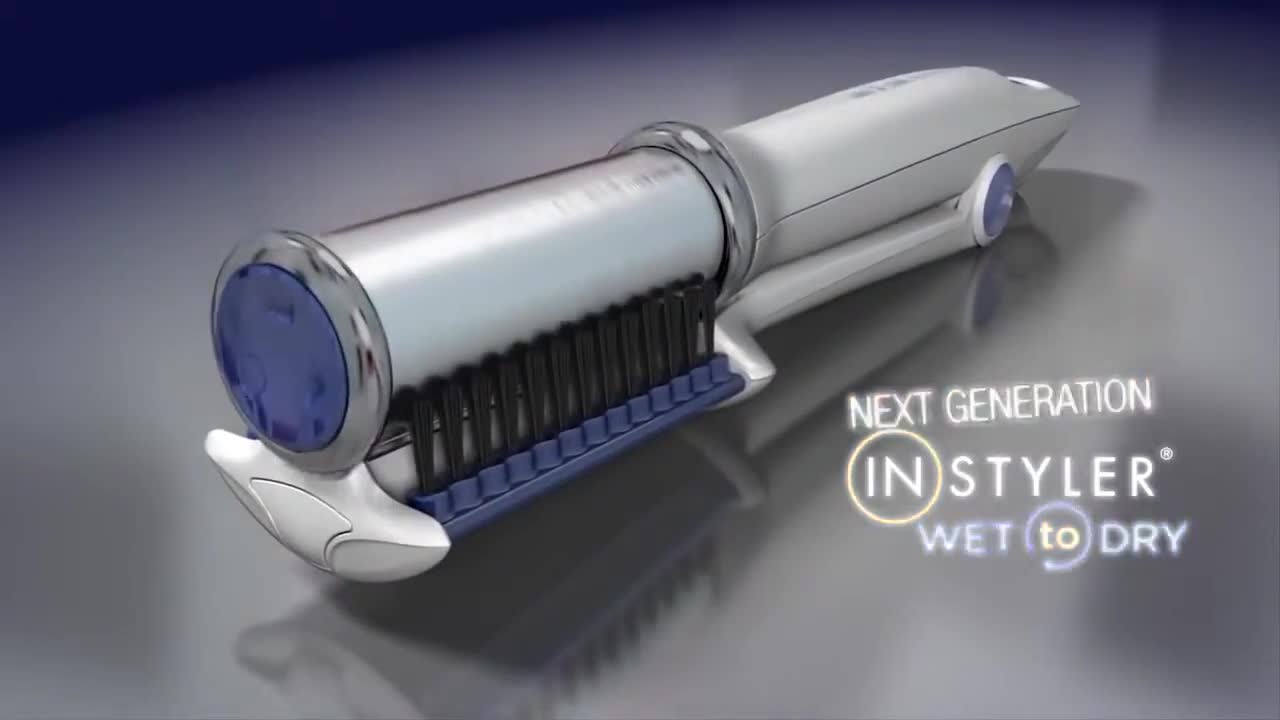 Image showing the INSTYLER Wet to Dry styler in action, drying and styling hair simultaneously.