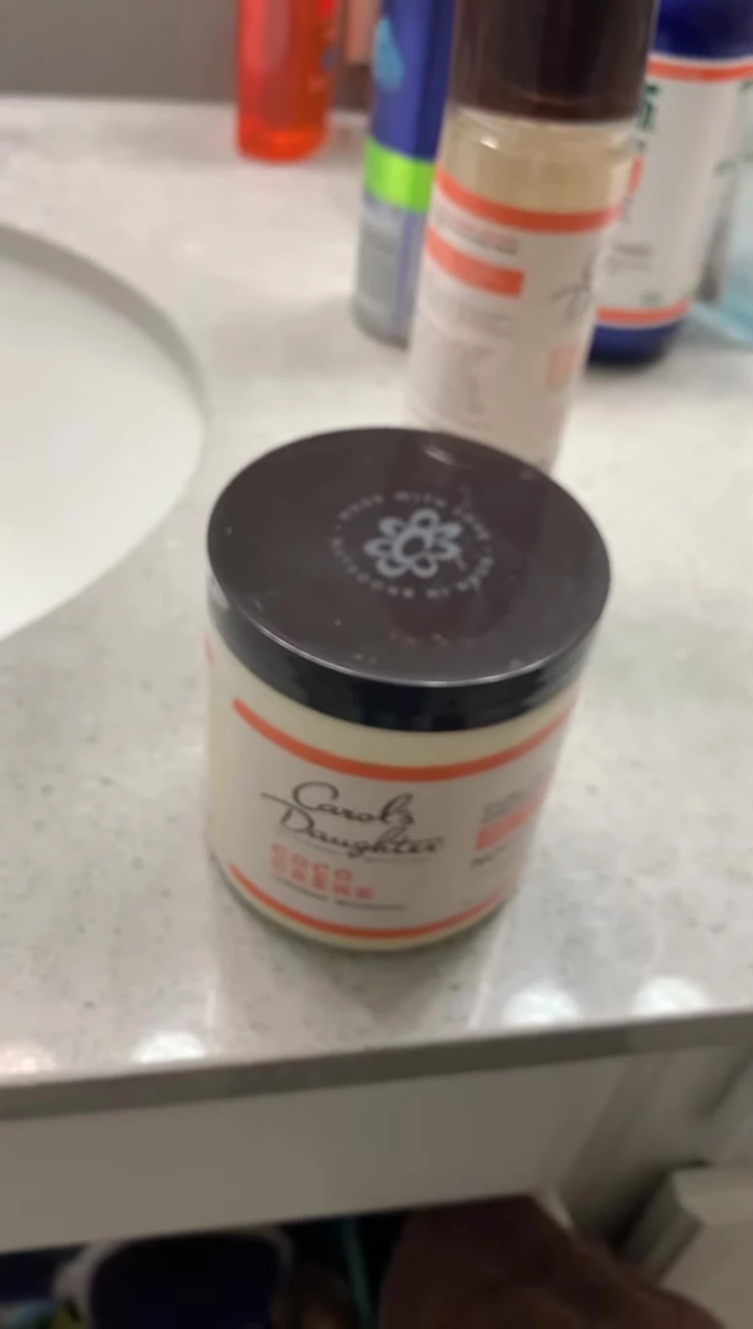 The individual applying the products to their hair